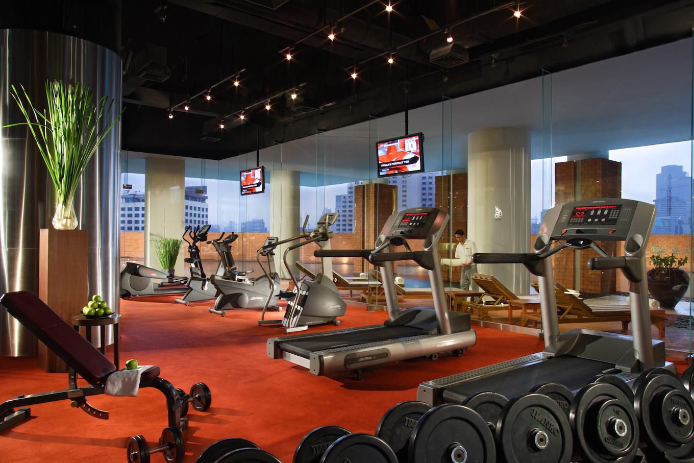 Hotel gym with treadmills and weights